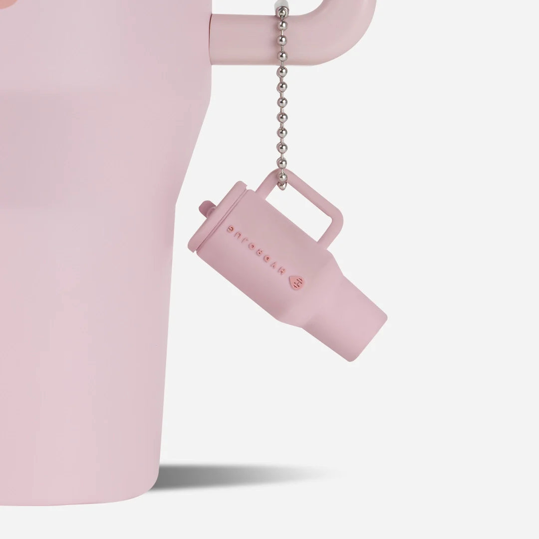 traveler-keychain-m0 Web-TravelerKeychainPhotos-PinkSand2.webp
